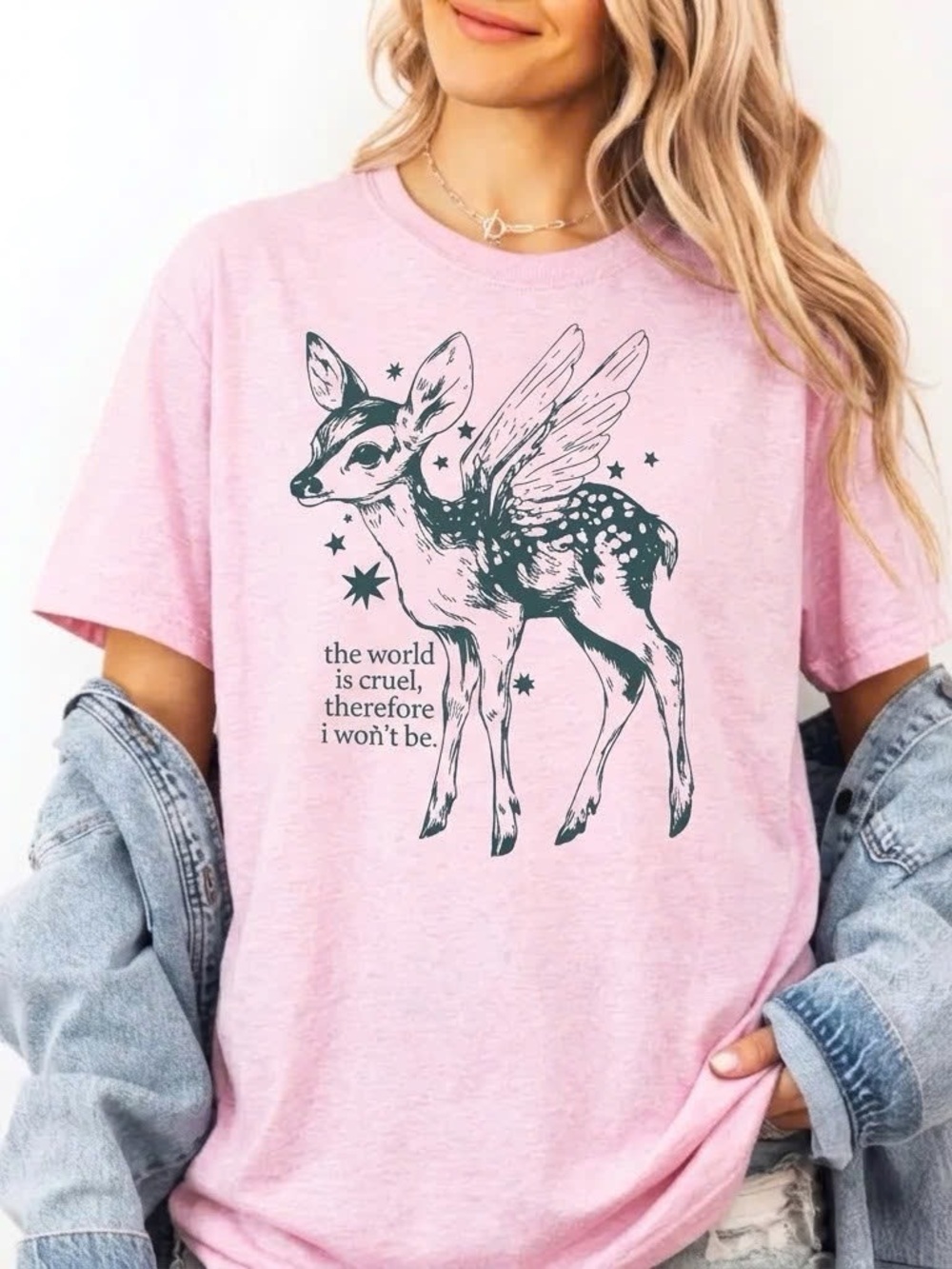 Cottagecore-style pink t-shirt featuring a winged fawn print.